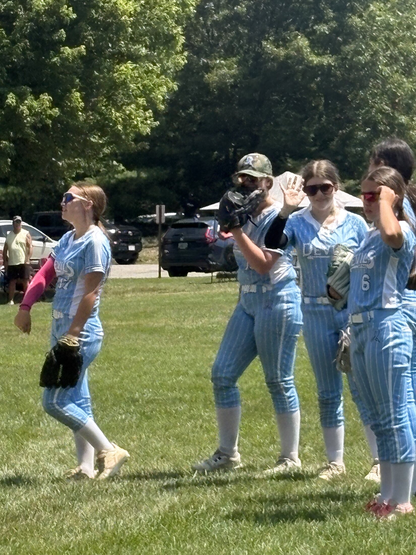 Metrowest Devils players celebrating together